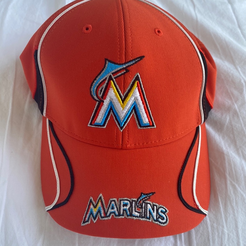 Authentic Miami Marlins baseball cap. Orange color,adjustable. Great condition.